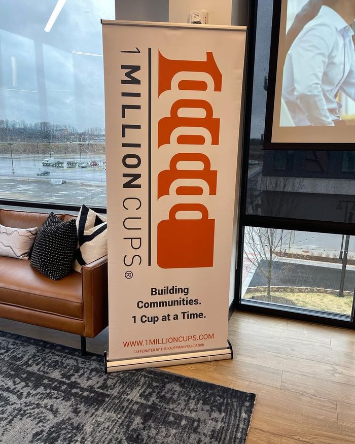 1 Million Cups banner at the event where Natalie presented